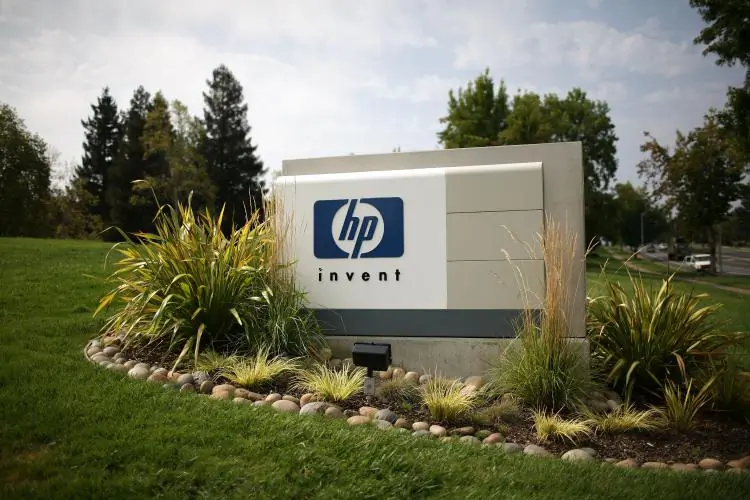 The HP logo is displayed on the entrance to the Hewlett-Packard Headquarters in Palo Alto, Calif.,. (Justin Sullivan/Getty Images)
