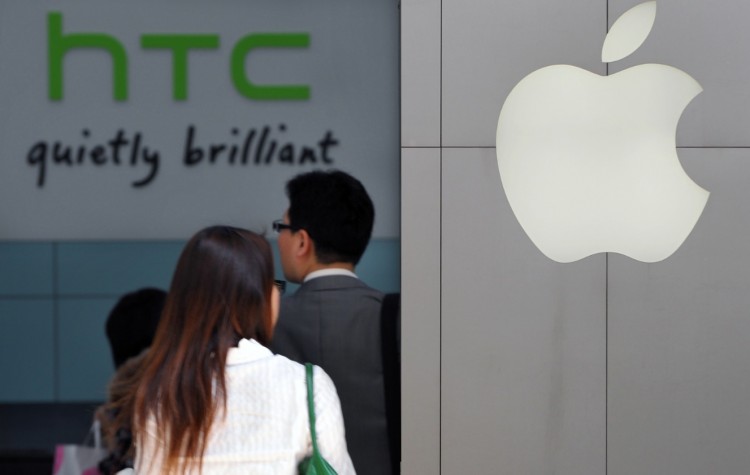 Apple Inc. has sued Taiwanese phone maker HTC Corp., accusing one of its top competitors in the smart phone market of stealing its touch-screen technology. (Sam Yeh & Lintao Zhang/Getty Images)