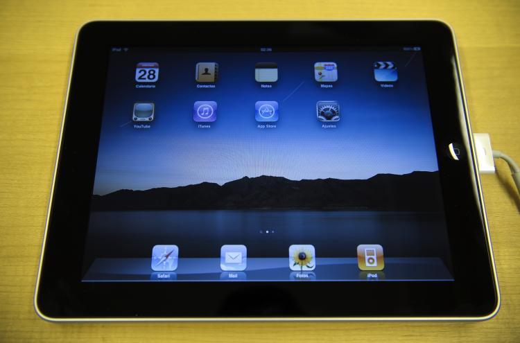 IPAD INSOMNIA: Using iPads before sleep may cause sleep disturbances. (Josef Lago/AFP/Getty Images) IPAD INSOMNIA: Using iPads before sleep may cause sleep disturbances. (Josef Lago/AFP/Getty Images)