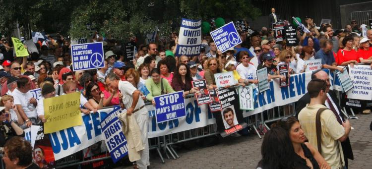 Protesters against Iranian leader Mahmoud Ahmadinejad stand outside the United Nations General Assembly in Midtown on Thursday. (Lixin Sun/The Epoch Times) Protesters against Iranian leader Mahmoud Ahmadinejad stand outside the United Nations General Assembly in Midtown on Thursday. (Lixin Sun/The Epoch Times)