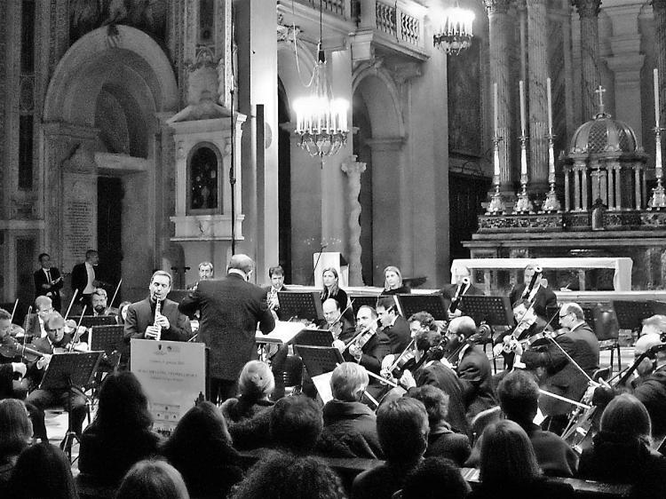 MUSIC TO REMIND: Musicians from the Institute of Symphonic Abruzzese in the the mountain city of L'Aquila perform for a Roman audience Jan. 1. Last April L'Aquila was ravaged by an earthquake and many residents are still without homes. The L'Aquila musicians say they don't want Italy to forget about the need in L'Aquila. (Dana Betlevy/Epoch Times Staff) MUSIC TO REMIND: Musicians from the Institute of Symphonic Abruzzese in the the mountain city of L'Aquila perform for a Roman audience Jan. 1. Last April L'Aquila was ravaged by an earthquake and many residents are still without homes. The L'Aquila musicians say they don't want Italy to forget about the need in L'Aquila. (Dana Betlevy/Epoch Times Staff)
