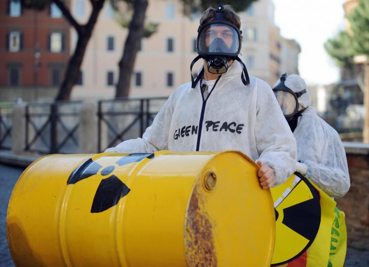 Greenpeace activists carry fake radioactive waste bins during a protest against nuclear power in the center of Rome on March 7, 2009. (Tiziana Fabi/AFP/Getty Images) Greenpeace activists carry fake radioactive waste bins during a protest against nuclear power in the center of Rome on March 7, 2009. (Tiziana Fabi/AFP/Getty Images)