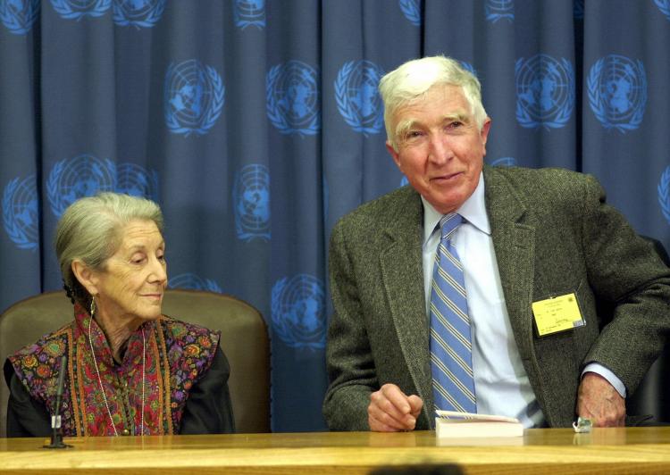 In this file photo, US author John Updike (R) speaks during a press conference at the United Nations in New York City. John Updike passed away at the age of 76. (MANDEL NGAN/AFP/Getty Images) In this file photo, US author John Updike (R) speaks during a press conference at the United Nations in New York City. John Updike passed away at the age of 76. (MANDEL NGAN/AFP/Getty Images)