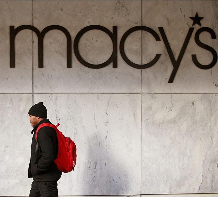 Macy's Inc. announced that it will cut nearly 4 percent of its workforce, 7,000 jobs, and cut owners dividends by 8.25 cents to 5 cents.  (Scott Olson/Getty Images)