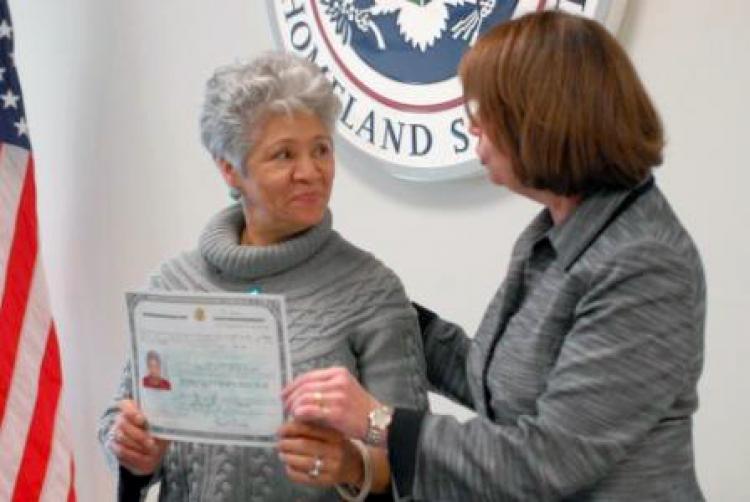 Jenis Martinez receives her new naturalization certificate from U.S. Citizenship and Immigration Services New York District Director Andrea Quarantillo. (Photos courtesy of USCIS) Jenis Martinez receives her new naturalization certificate from U.S. Citizenship and Immigration Services New York District Director Andrea Quarantillo. (Photos courtesy of USCIS)