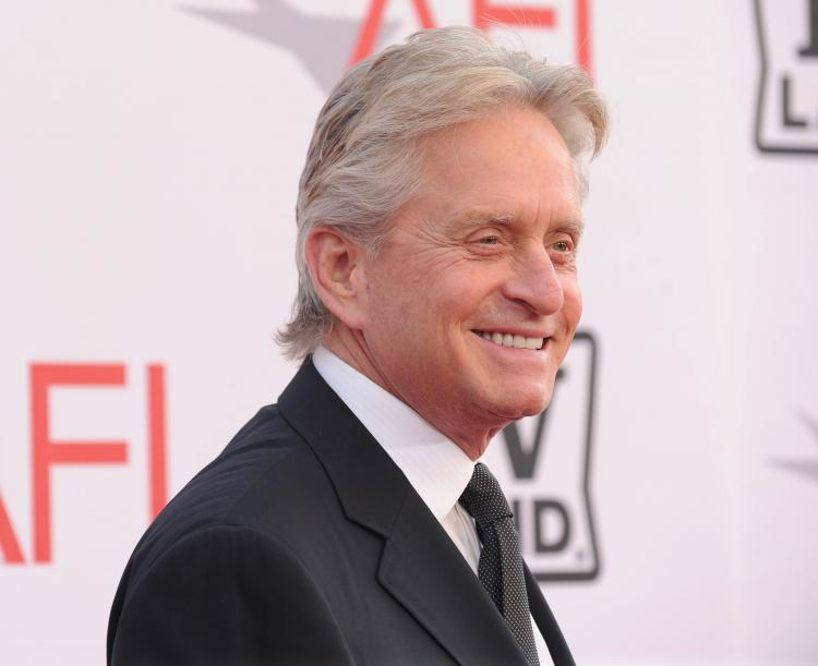 Michael Douglas said he has remained upbeat during his battle with cancer, watching lots of sports in the process. (Alberto E. Rodriguez/Getty Images) Michael Douglas said he has remained upbeat during his battle with cancer, watching lots of sports in the process. (Alberto E. Rodriguez/Getty Images)