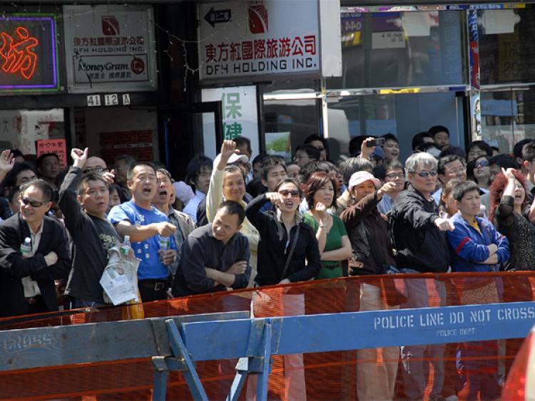 An angry mob heckles organizers at the Quit the CCP Center in Flushings, New York. (Th Epoch Times) An angry mob heckles organizers at the Quit the CCP Center in Flushings, New York. (Th Epoch Times)
