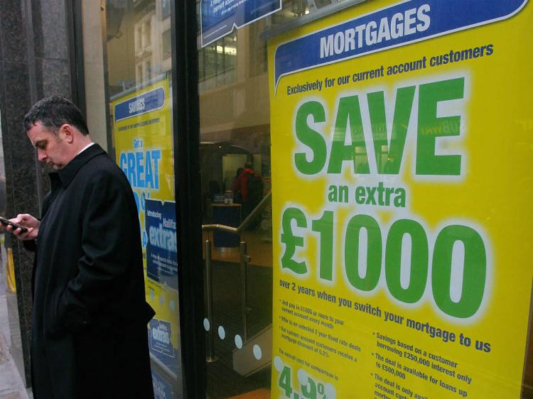 A window display advertising mortgages is pictured at a Halifax bank branch in central London, on January 19, 2009. (Carl de Souza/AFP/Getty Images) A window display advertising mortgages is pictured at a Halifax bank branch in central London, on January 19, 2009. (Carl de Souza/AFP/Getty Images)