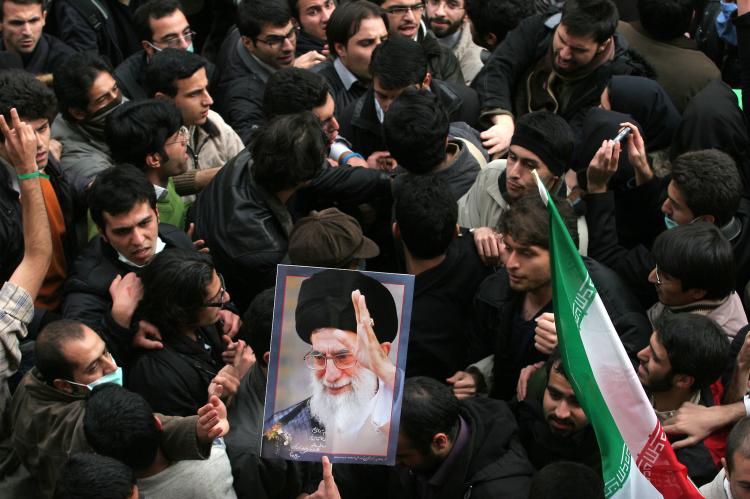 Iranian supporters (L) of defeated presidential candidate Mir Hossein Mousavi clash with supporters (R) of supreme leader Ayatollah Ali Khamenei (picture) at Tehran University in the Iranian capital on December 7, 2009. (-/AFP/Getty Images) Iranian supporters (L) of defeated presidential candidate Mir Hossein Mousavi clash with supporters (R) of supreme leader Ayatollah Ali Khamenei (picture) at Tehran University in the Iranian capital on December 7, 2009. (-/AFP/Getty Images)