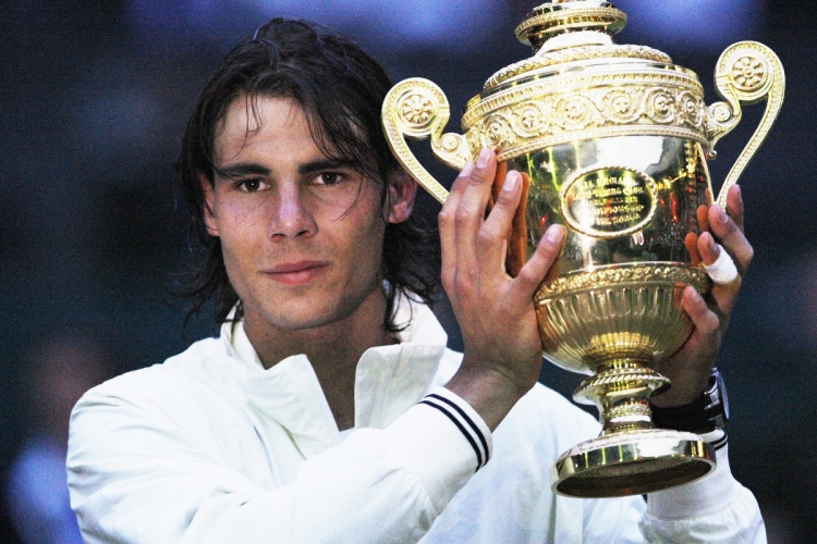 Spains Rafael Nadal poses with his trophy after defeating Switzerlands Roger Federer during the final match of the 2008 Wimbledon championships on Sunday. (Adrian Dennis/AFP/Getty Images) Spains Rafael Nadal poses with his trophy after defeating Switzerlands Roger Federer during the final match of the 2008 Wimbledon championships on Sunday. (Adrian Dennis/AFP/Getty Images)