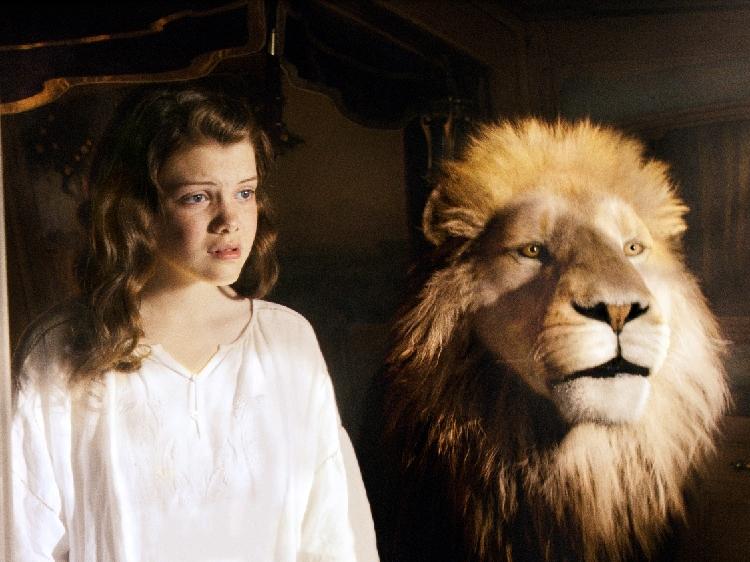 Georgie Henley and Aslan the Lion in a scene from 'The Chronicles of Narnia: The Voyage of the Dawn Treader.' Georgie Henley and Aslan the Lion in a scene from 'The Chronicles of Narnia: The Voyage of the Dawn Treader.'