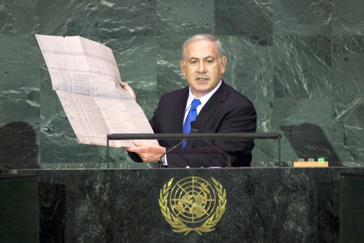 Benjamin Netanyahu, prime minister of Israel, addresses the United Nations General Assembly at the U.N. headquarters in New York City, holding what he said were Nazi plans for the Aushwitz concentration camp on Sept. 24. (Michael Nagle/Getty Images) Benjamin Netanyahu, prime minister of Israel, addresses the United Nations General Assembly at the U.N. headquarters in New York City, holding what he said were Nazi plans for the Aushwitz concentration camp on Sept. 24. (Michael Nagle/Getty Images)