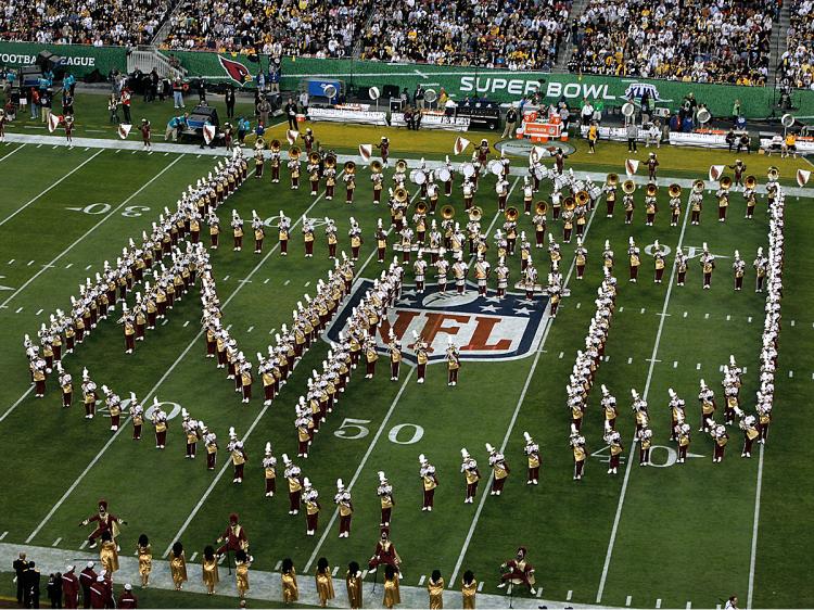 A marching band performs during the pre-game show prior to the start of Super Bowl XLIII between the Arizona Cardinals and the Pittsburgh Steelers on February 1, 2009 at Raymond James Stadium in Tampa, Florida. (Doug Benc/Getty Images)