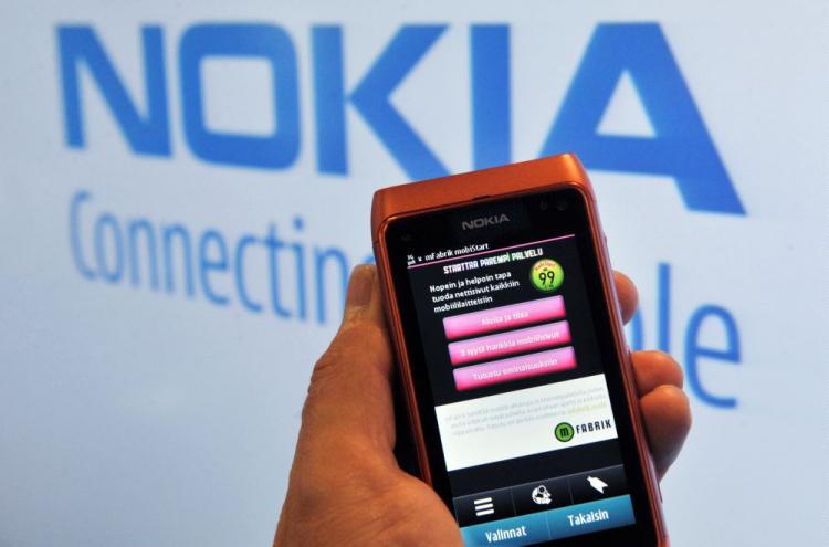 Nokia's N8 smartphone is pictured at Nokia's flagship store in Helsinki, Finland on Oct 21. The N8 is Nokia's latest attempt to wrestle market share from Apple Inc. and Research In Motion Ltd. (Markku Ulandaer/AFP/Getty Images ) Nokia's N8 smartphone is pictured at Nokia's flagship store in Helsinki, Finland on Oct 21. The N8 is Nokia's latest attempt to wrestle market share from Apple Inc. and Research In Motion Ltd. (Markku Ulandaer/AFP/Getty Images )