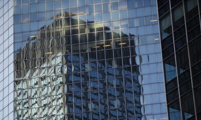 Ofiice buildings reflect each other in Manhattan's business Midtown district in New York on Jan. 12, 2010.  (Emmanuel Dunand/AFP/Getty Images)