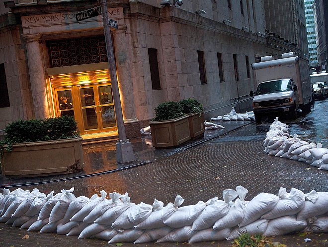 The New York Stock Exchange is seen surrounded with sand bags on Monday, Oct. 29 in New York City. U.S. equity markets were mostly closed Monday due to effects of Hurricane Sandy.  Andrew Burton/Getty Images 
