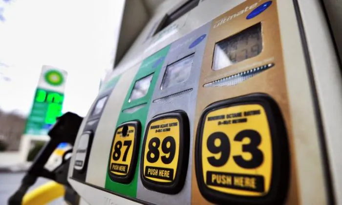 Gas prices continue their upward climb, bucking oil trends. (Jewel Samad/AFP/Getty Images)