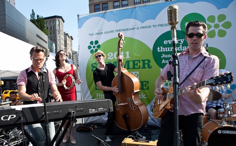 OLD SCHOOL: Million Dollar Quarter pleased the crowd on Thursday at 'Summer in the Square,' with retro hits including 'Hound Dog' by Elvis Presley. (Amal Chen/The Epoch Times) OLD SCHOOL: Million Dollar Quarter pleased the crowd on Thursday at 'Summer in the Square,' with retro hits including 'Hound Dog' by Elvis Presley. (Amal Chen/The Epoch Times)
