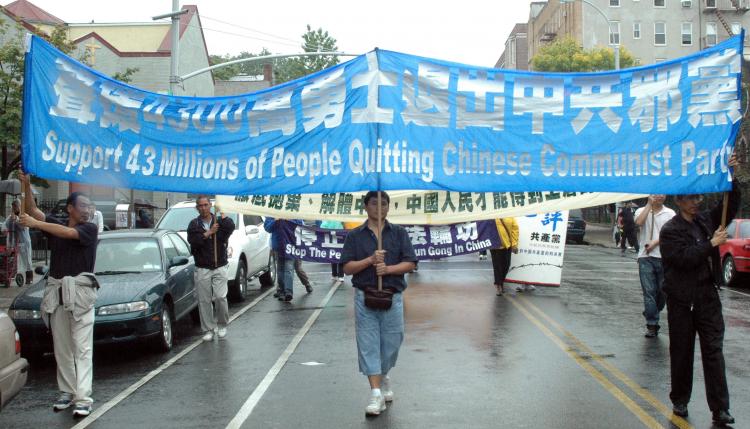 40 Million and Counting: Marchers in a Parade in Brooklyn Chinatown Sunday celebrate the resignation of more than 40 million people from the Chinese Communist Party. (Jonathan Weeks/The Epoch Times)