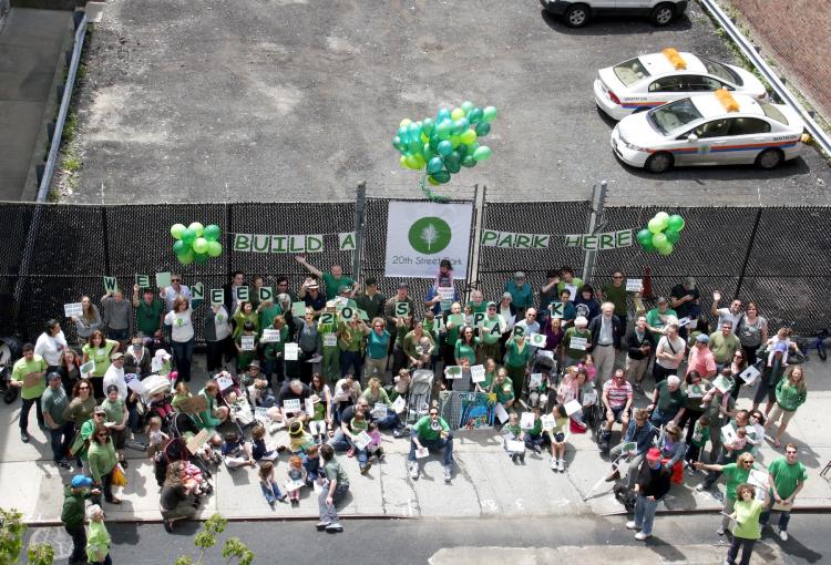 CHELSEA GREENS: Residents of Chelsea posed for a photo in front of a lot on West 20th Street on Sunday. They hope the city will use the space to create a new park. (Ivan Pentchoukov/The Epoch Times) CHELSEA GREENS: Residents of Chelsea posed for a photo in front of a lot on West 20th Street on Sunday. They hope the city will use the space to create a new park. (Ivan Pentchoukov/The Epoch Times)
