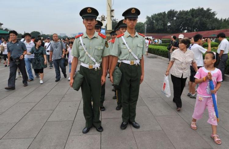 Military police squad patrols Tiananmen Square. (Ted Aljibeapp/Getty Images) Military police squad patrols Tiananmen Square. (Ted Aljibeapp/Getty Images)