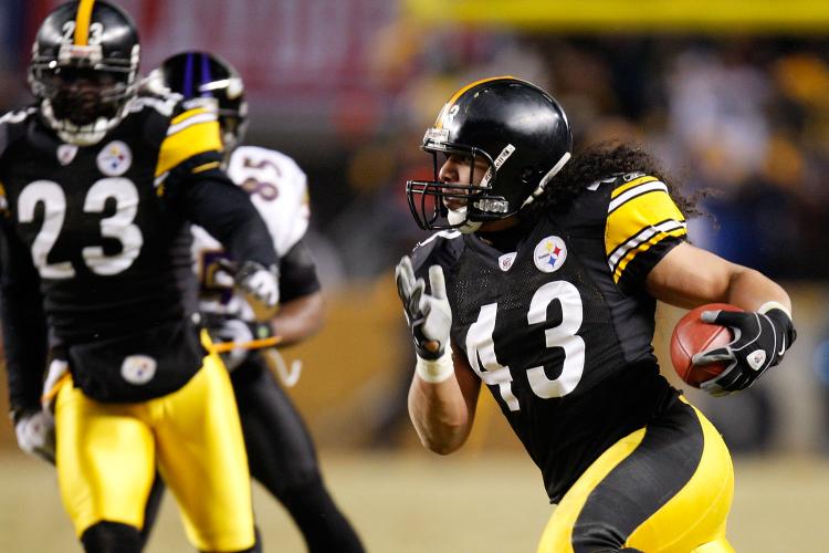 KEY PLAY: Steelers safety Troy Polamalu returns an interception 40 yards to put the game out of reach of the Ravens. ( Gregory Shamus/Getty Images) KEY PLAY: Steelers safety Troy Polamalu returns an interception 40 yards to put the game out of reach of the Ravens. ( Gregory Shamus/Getty Images)