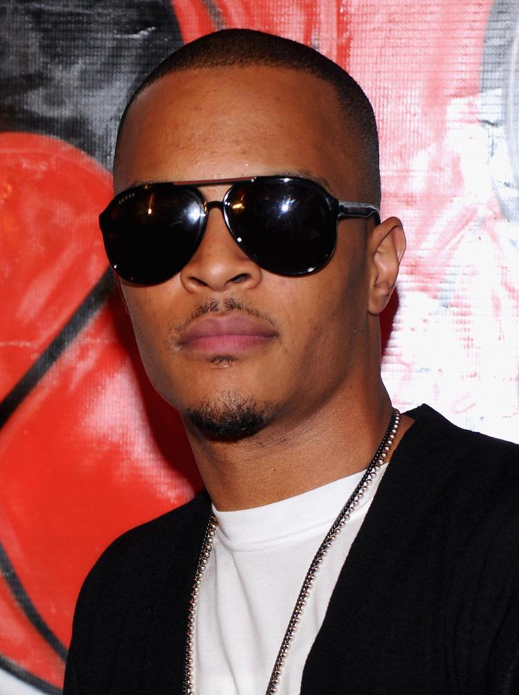 Rapper T.I. convinced a man to not jump from a 22-story building this week, according to reports. He will face a judge on September drug charges on Friday. (Jamie McCarthy/Getty Images) Rapper T.I. convinced a man to not jump from a 22-story building this week, according to reports. He will face a judge on September drug charges on Friday. (Jamie McCarthy/Getty Images)