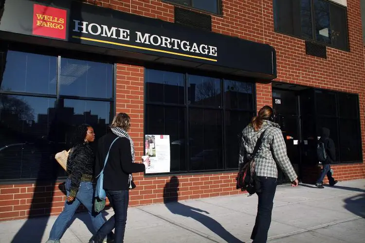 Refinancing applications have dipped more than 11 percent and expected home sales have slowed, the Mortgage Bankers Association said. (Spencer Platt/Getty Images)