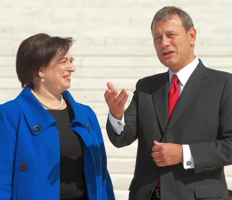 U.S. Supreme Court Chief Justice John Roberts and Justice Elena Kagan(L) speak outside the U.S. Supreme Court October 1, 2010, after an investiture ceremony inside for Kagan. (Paul J. Richards/AFP/Getty Images)