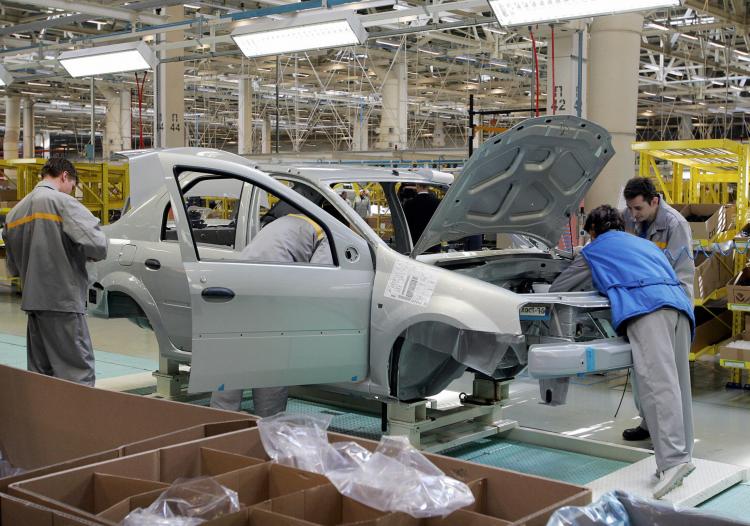 Employees of the Avtoframos automobile plant assemble a Renault Logan model in Moscow. Russia is one of the hardest-hit by the global economic crisis, causing the country to plunge into its first recession since 1998. (Alexander Nemenov/AFP/Getty Images) Employees of the Avtoframos automobile plant assemble a Renault Logan model in Moscow. Russia is one of the hardest-hit by the global economic crisis, causing the country to plunge into its first recession since 1998. (Alexander Nemenov/AFP/Getty Images)