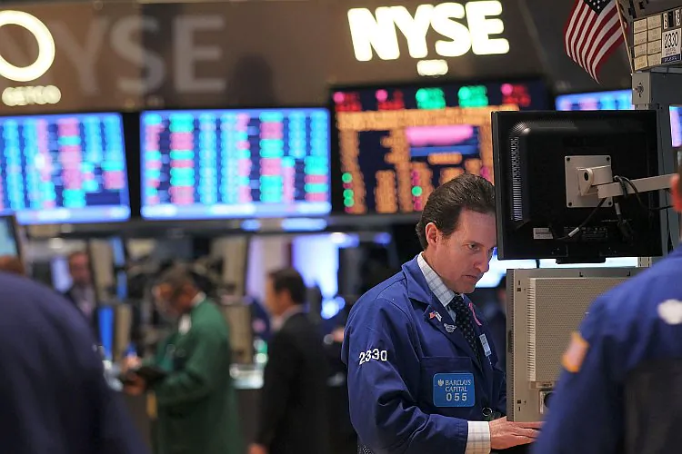 A floor trader is seen working at the New York Stock Exchange.  (Spencer Platt/Getty Images)