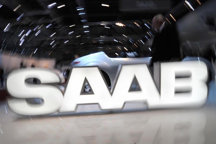 A logo of the Swedish car manufacturer Saab owned by General Motors is displayed during the 79th Geneva Car Show on March 3 in Geneva. Saab faces an uncertain future as its market share drops and parent General Motors struggles to survive. (Fabrice Coffrini/AFP/Getty Images) A logo of the Swedish car manufacturer Saab owned by General Motors is displayed during the 79th Geneva Car Show on March 3 in Geneva. Saab faces an uncertain future as its market share drops and parent General Motors struggles to survive. (Fabrice Coffrini/AFP/Getty Images)