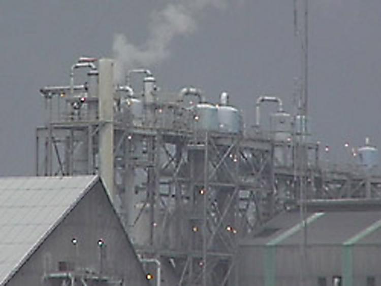 Scrubbers on the stacks of this fertilizer plant filter out the fluoride that would otherwise poison the environment. (Michael and Paul Connett) Scrubbers on the stacks of this fertilizer plant filter out the fluoride that would otherwise poison the environment. (Michael and Paul Connett)
