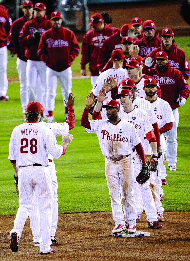 Philadelphia celebrates its victory over N.Y. in Game 5. (Jeff Zelevansky/Getty Images) Philadelphia celebrates its victory over N.Y. in Game 5. (Jeff Zelevansky/Getty Images)
