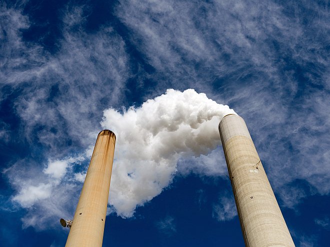 Smoke stacks from a power plant are seen in this file photo. (Saul Loeb/AFP/Getty Images) 