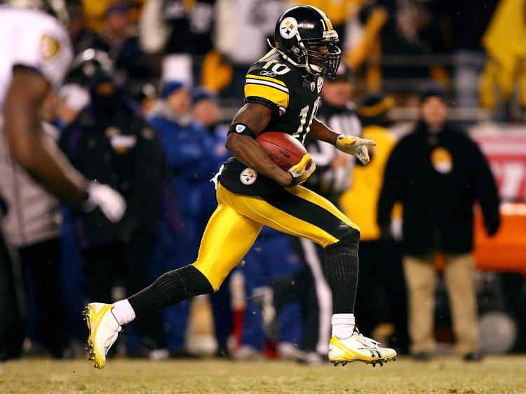 Santonio Holmes #10 of the Pittsburgh Steelers runs for a 65-yard touchdown against the Baltimore Ravens during the AFC Championship game on January 18. (Al Bello/Getty Images) Santonio Holmes #10 of the Pittsburgh Steelers runs for a 65-yard touchdown against the Baltimore Ravens during the AFC Championship game on January 18. (Al Bello/Getty Images)