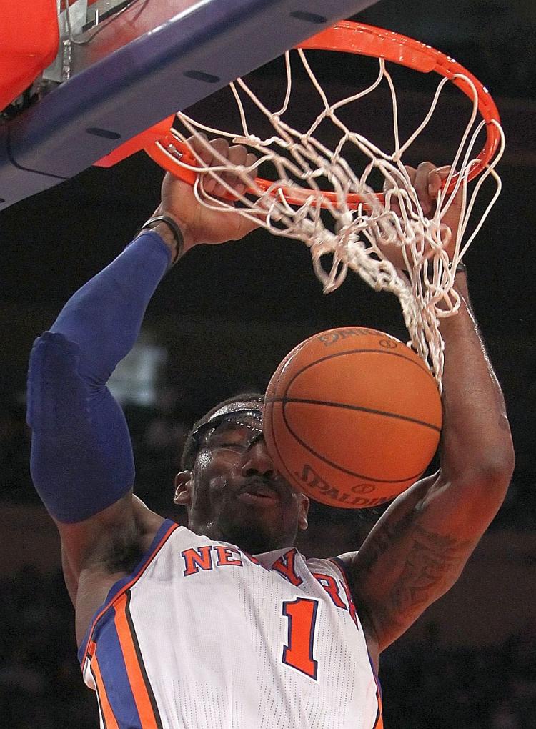Amar'e Stoudemire's 30 points lifted the New York Knicks over the Denver Nuggets on Sunday. (Nick Laham/Getty Images) Amar'e Stoudemire's 30 points lifted the New York Knicks over the Denver Nuggets on Sunday. (Nick Laham/Getty Images)