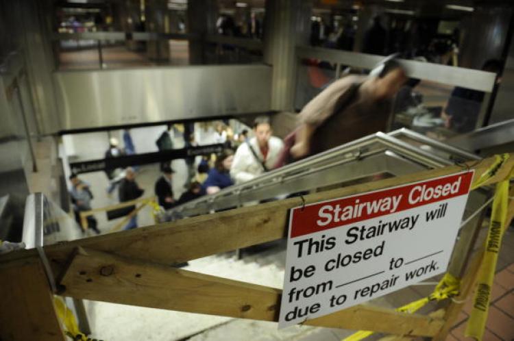 New York commuters make their way past a closed stairway undergoing repairs at a subway station in New York, May 20, 2008. The New York subway, which carries some five million people daily, is faced with regular functional glitches due to its ageing infra (Emmanuel Dumand/AFP/Getty Images) New York commuters make their way past a closed stairway undergoing repairs at a subway station in New York, May 20, 2008. The New York subway, which carries some five million people daily, is faced with regular functional glitches due to its ageing infra (Emmanuel Dumand/AFP/Getty Images)