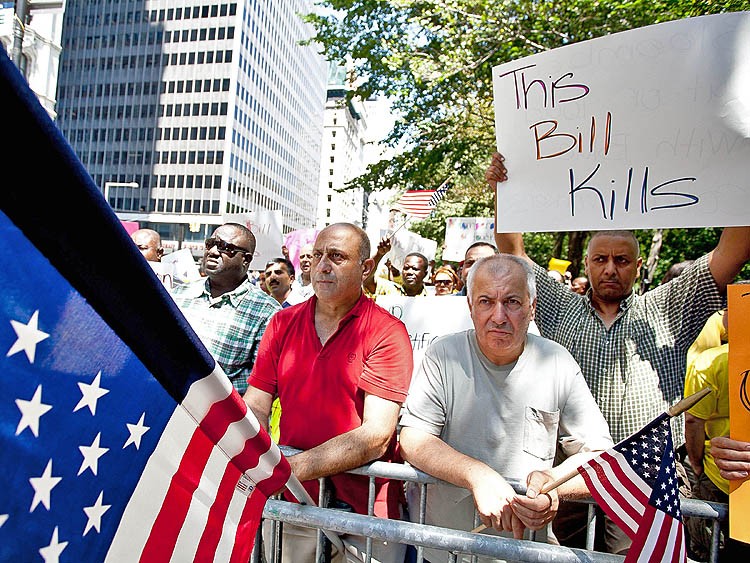ANTI-PROFILING: Bhairavi Desai, executive director of the New York Taxi Workers Alliance and Taxi drivers protested the recent recommendation of the New York State Federation of Taxi Drivers that drivers should profile their fares based on ethnicity. (The Epoch Times) ANTI-PROFILING: Bhairavi Desai, executive director of the New York Taxi Workers Alliance and Taxi drivers protested the recent recommendation of the New York State Federation of Taxi Drivers that drivers should profile their fares based on ethnicity. (The Epoch Times)