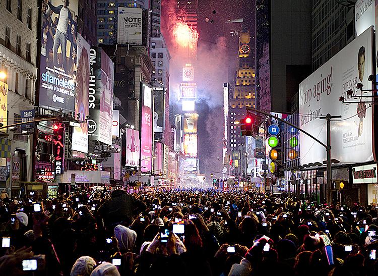 Ball Drop 2011: Times Square lights up at midnight EST, announcing 2011 in New York City. (Edward Dai/The Epoch Times) Ball Drop 2011: Times Square lights up at midnight EST, announcing 2011 in New York City. (Edward Dai/The Epoch Times)