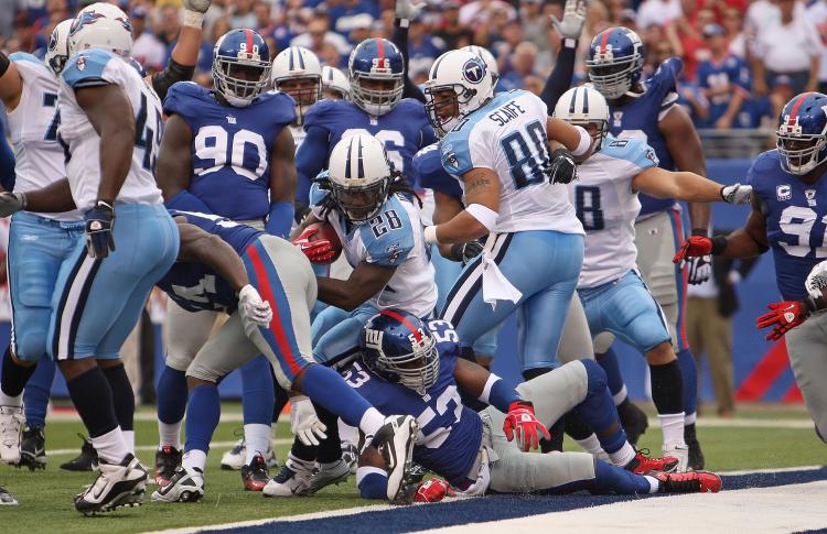 Chris Johnson (No. 28) of the Tennessee Titans gets his first of two touchdowns against the New York Giants at the New Meadowlands on Sunday. (Mike Ehrmann/Getty Images) Chris Johnson (No. 28) of the Tennessee Titans gets his first of two touchdowns against the New York Giants at the New Meadowlands on Sunday. (Mike Ehrmann/Getty Images)