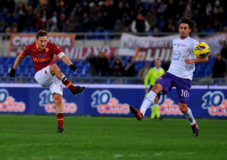 AS Roma forward Francesco Totti scores against Fiorentina in Saturday's Serie A action at the Stadio Olimpico. (Tiziana Fabi/AFP/Getty Images) 