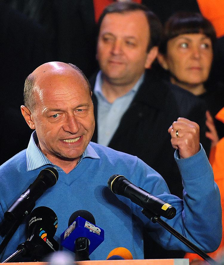 WINNER: Romania incumbent President Traian Basescu addresses supporters at Democratic-Liberal Party's headquarters after declaring himself the winner on Dec. 6 in Bucharest. (Daniel Mihailescu/AFP/Getty Images)