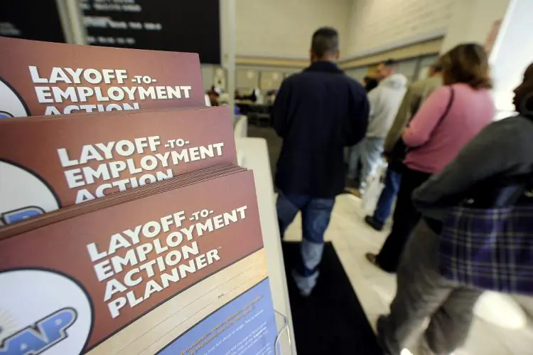 An unemployment benefits extension will not apply for Nevadans that have exhausted benefits. Above, job-seekers wait in line for assistance at a government-run employment center, in Las Vegas, Nev., on Nov. 9, 2010. (Robyn Beck/AFP/Getty Images)