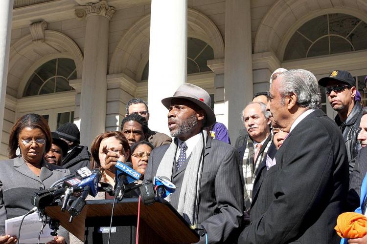 DEMOCRAT SOLIDARITY: While New York unions have stood in solidarity with Wisconsin unions over the last week, New York's Democratic politicians, including state Sen. Bill Perkins (C), came out to stand with their Wisconsin colleagues at City Hall on Sunday. (Tara MacIsaac/The Epoch Times)