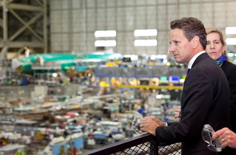 FACTORY ACTIVITY: Treasury Secretary Timothy Geithner looks over the production line during a tour of the Boeing 737 plant earlier this year in Renton, Washington. (Stephen Brashear/Getty Images ) FACTORY ACTIVITY: Treasury Secretary Timothy Geithner looks over the production line during a tour of the Boeing 737 plant earlier this year in Renton, Washington. (Stephen Brashear/Getty Images )