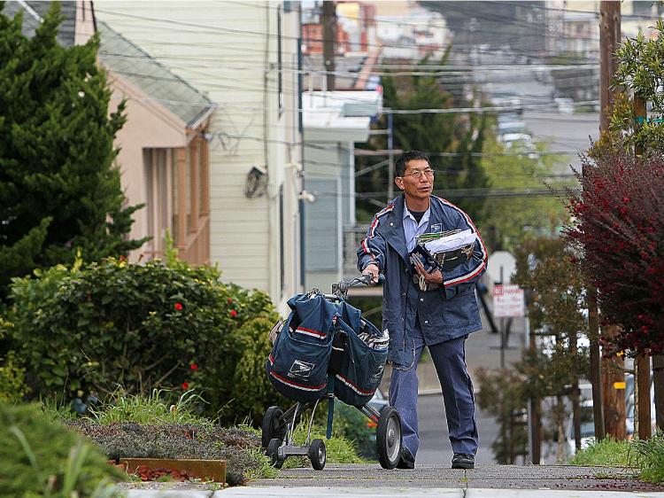 The Postal Service has been losing money since 2007 and is facing a $7 billion shortfall this year. (Justin Sullivan/Getty Images)