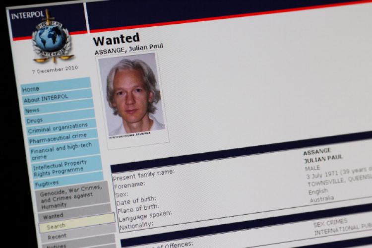 A picture shows the Interpol webpage with the portrait of Australian Julian Assange. (Thomas Coex/AFP/Getty Images) A picture shows the Interpol webpage with the portrait of Australian Julian Assange. (Thomas Coex/AFP/Getty Images)
