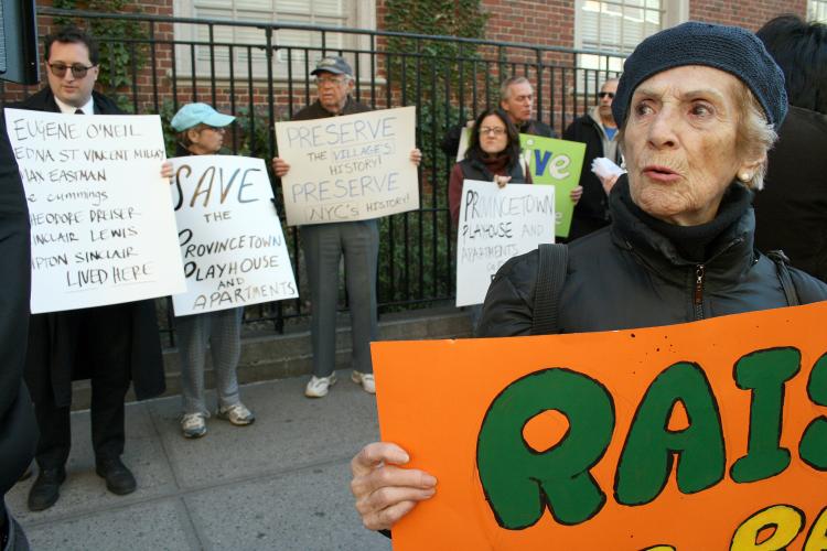 DEMOLITION STANDOFF: Activists protest the planned demolition of a beloved historic theatre, Provincetown Playhouse, in the Village on Monday. The building is owned by NYU, which plans to construct a new law school building on the site. (R) Emily Silver-Fabella Stevens, Producer, Director, Writer. (Katy Mantyk/Epoch Times) DEMOLITION STANDOFF: Activists protest the planned demolition of a beloved historic theatre, Provincetown Playhouse, in the Village on Monday. The building is owned by NYU, which plans to construct a new law school building on the site. (R) Emily Silver-Fabella Stevens, Producer, Director, Writer. (Katy Mantyk/Epoch Times)