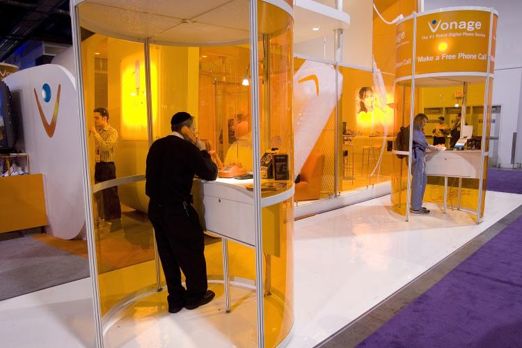 The photo shows the Vonage booth at the 2008 International Consumer Electronics Show. Vonage Holdings Inc. announced a $55 million loss for Q3 2009, attributing it to a strange accounting error caused by a rise in stock prices earlier in the quarter. (David Paul Morris/Getty Images) The photo shows the Vonage booth at the 2008 International Consumer Electronics Show. Vonage Holdings Inc. announced a $55 million loss for Q3 2009, attributing it to a strange accounting error caused by a rise in stock prices earlier in the quarter. (David Paul Morris/Getty Images)